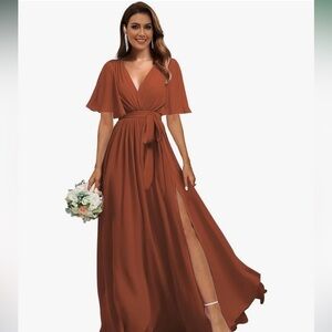 Long burnt/rust orange gown. NEVER USED